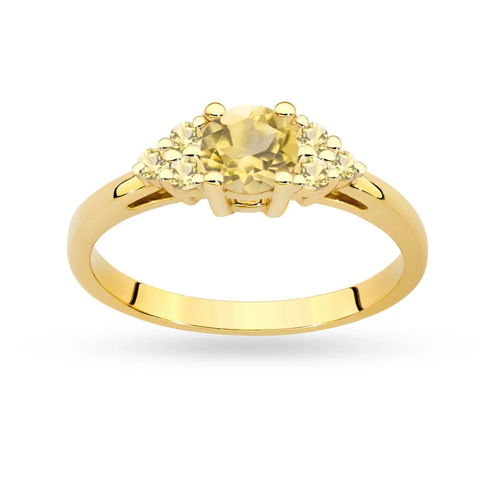 Prsteň zo 14-karátového (585) zlata s 0,50 ct citrínom a 6 bronzovými diamantmi. Perfektný ako darček.
