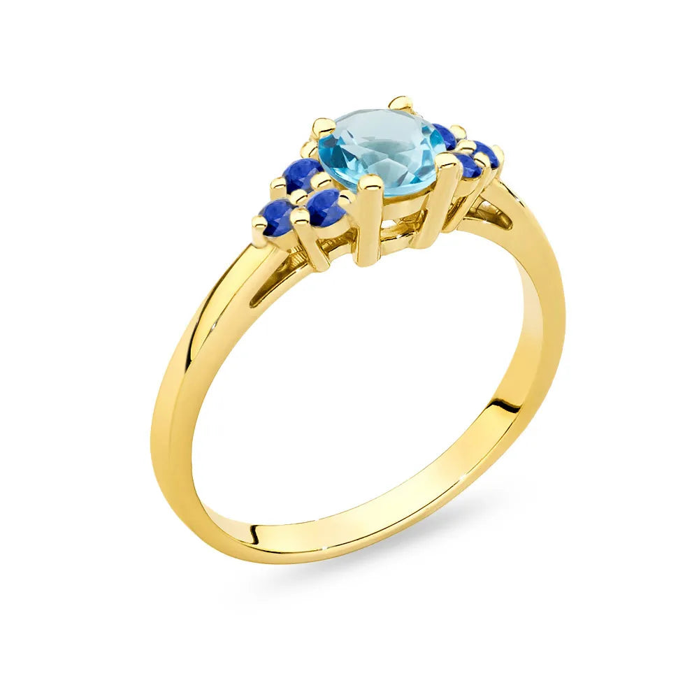 Gold 14k(585) ring with 0,50ct topaz with 6 sapphires. Perfect for a gift.