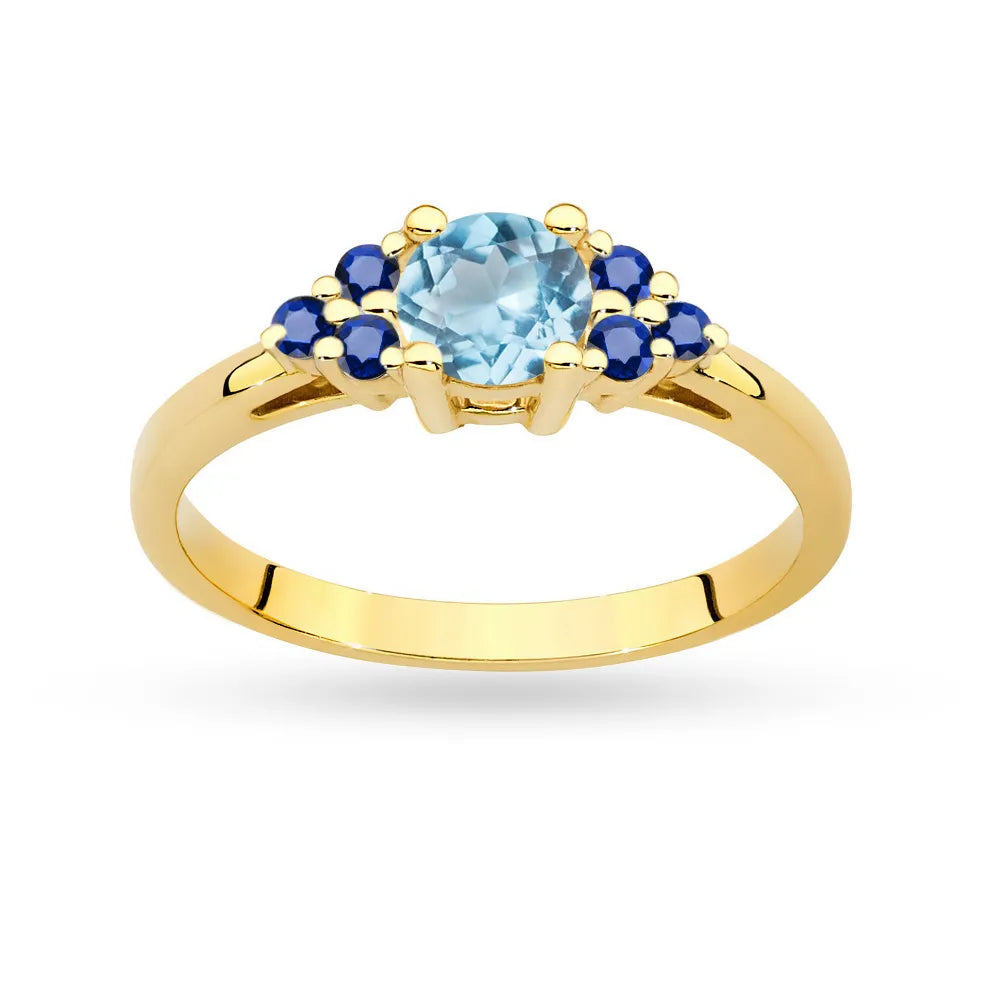 Gold 14k(585) ring with 0,50ct topaz with 6 sapphires. Perfect for a gift.