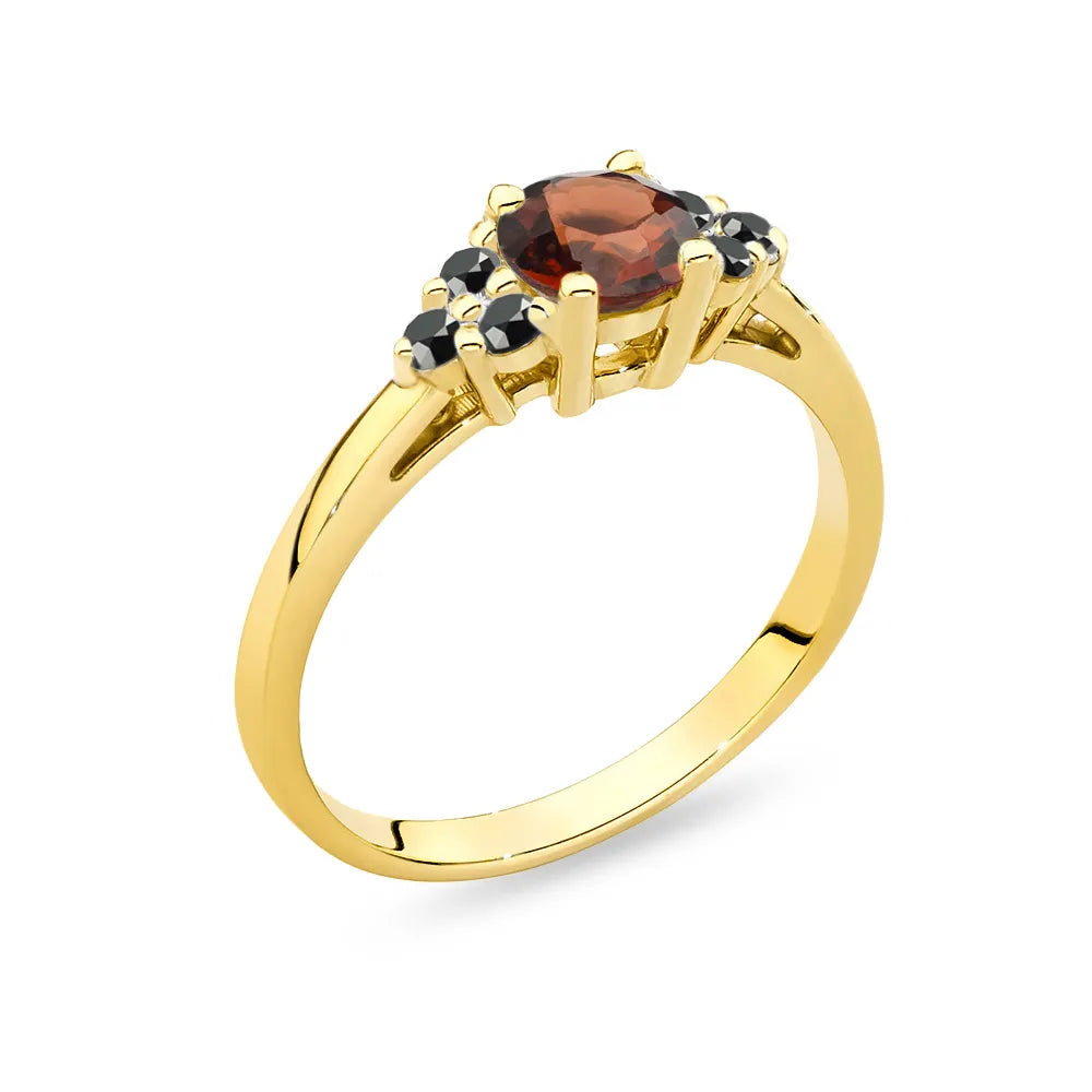 Gold 14k(585) ring with 0,60ct garnet with 6 black diamonds. Perfect for a gift.