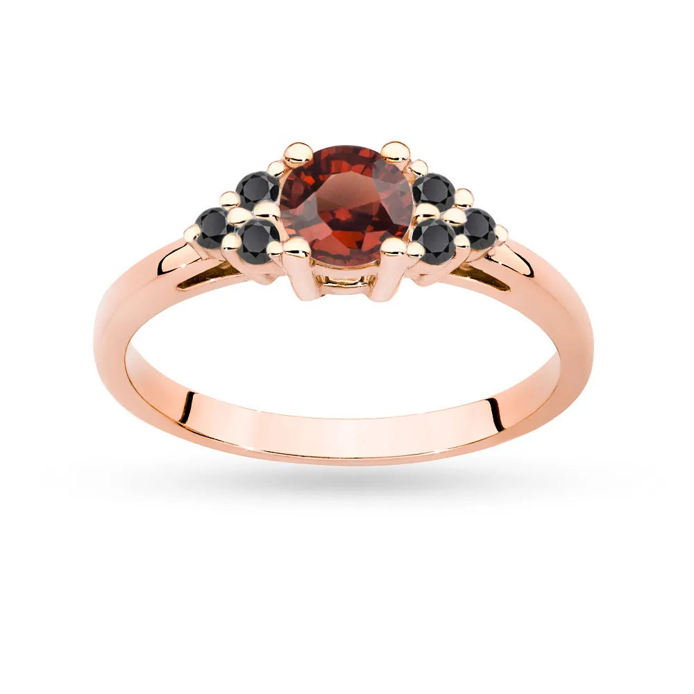 Rose Gold 14k(585) ring with 0,60ct garnet with 6 black diamonds. Perfect for a gift.