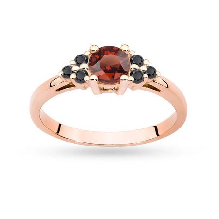 Rose Gold 14k(585) ring with 0,60ct garnet with 6 black diamonds. Perfect for a gift.
