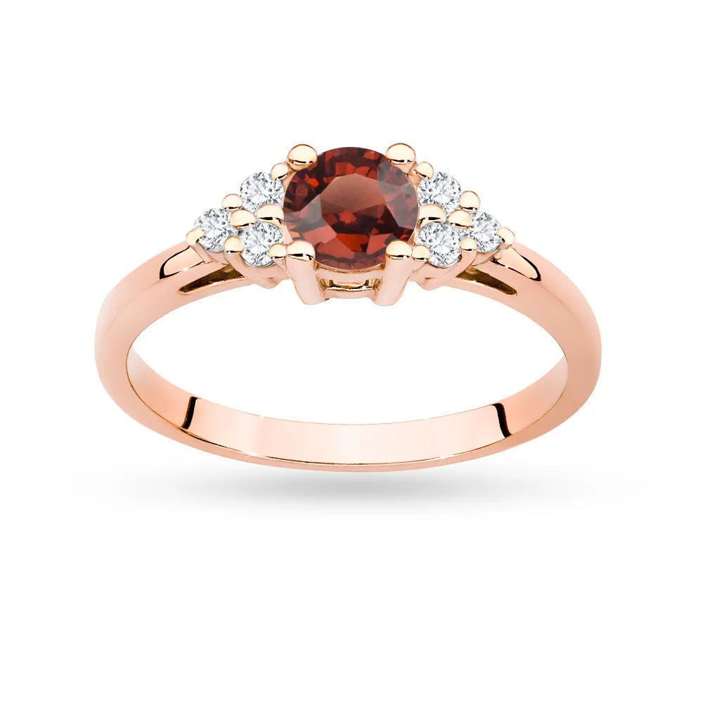 Rose Gold 14k(585) ring with 0,60ct garnet with 6 diamonds. Perfect for a gift.