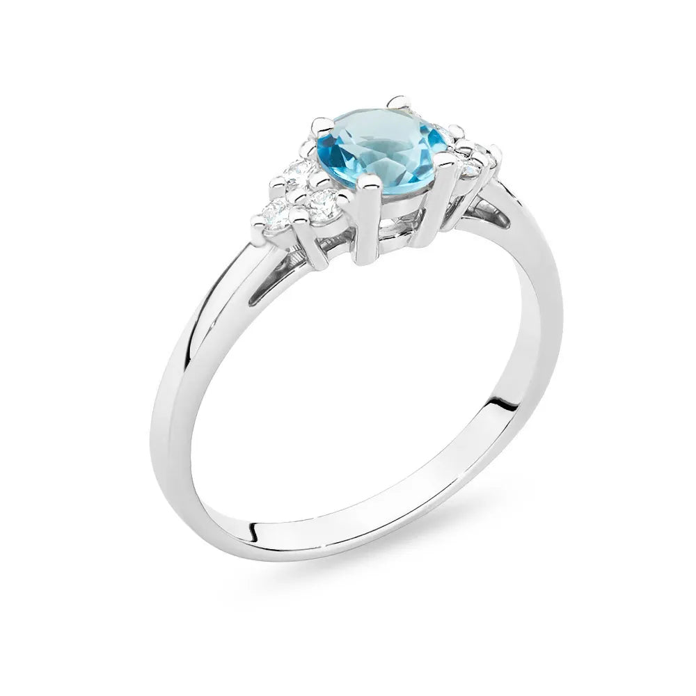 White Gold 14k(585) ring with 0,50ct topaz with 6 diamonds. Perfect for a gift.
