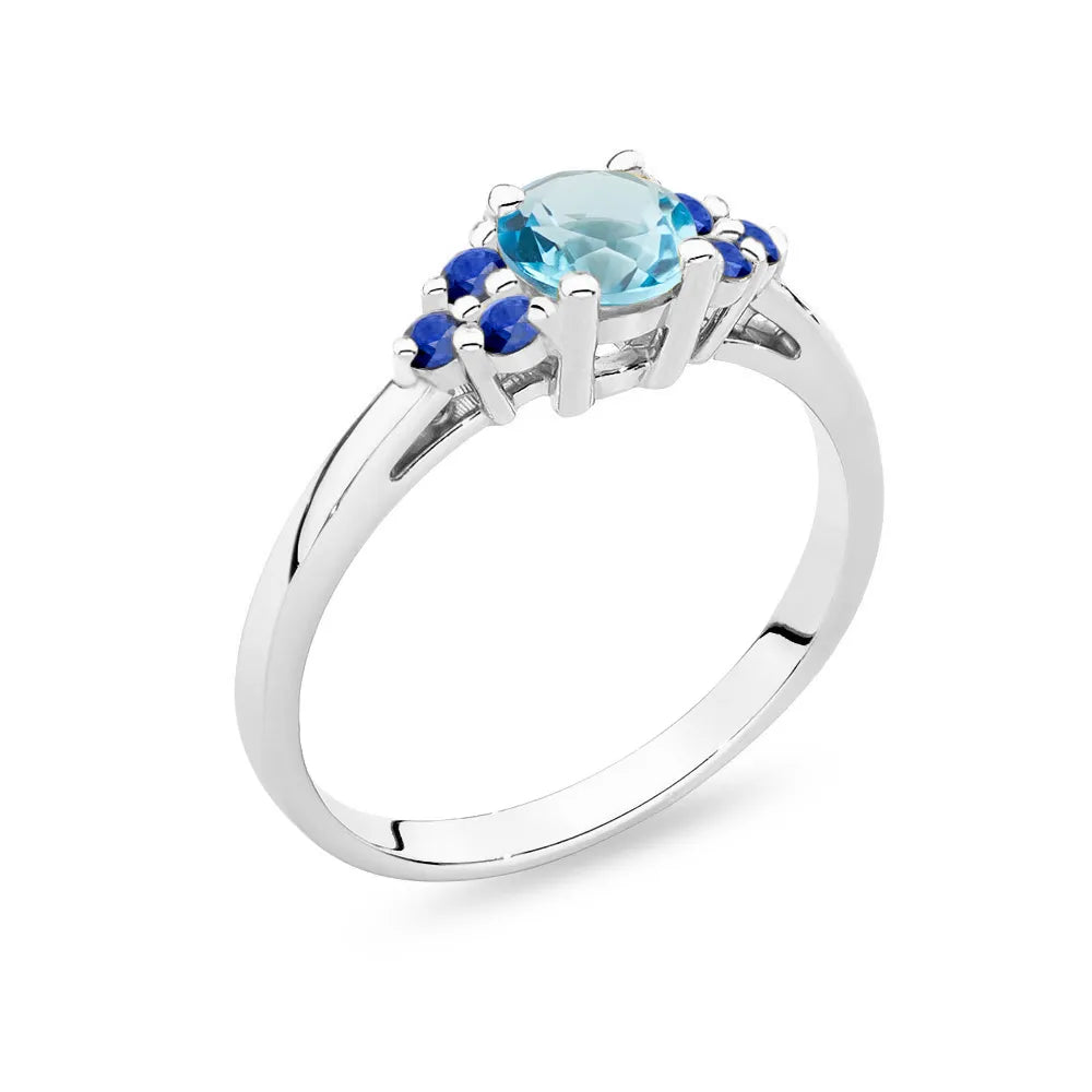 White Gold 14k(585) ring with 0,50ct topaz with 6 sapphires. Perfect for a gift.