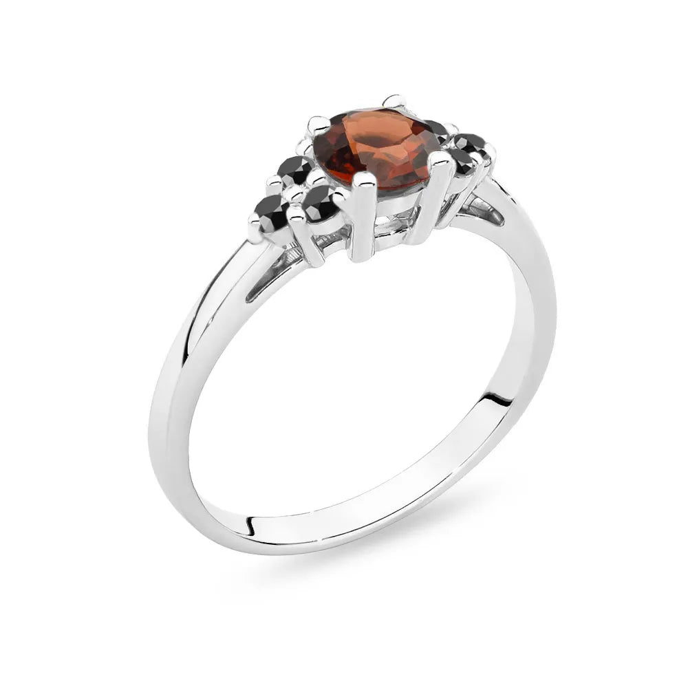 White Gold 14k(585) ring with 0,60ct garnet with 6 black diamonds. Perfect for a gift.