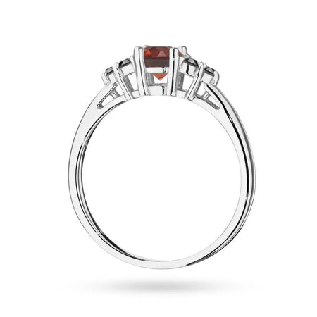 White Gold 14k(585) ring with 0,60ct garnet with 6 black diamonds. Perfect for a gift.
