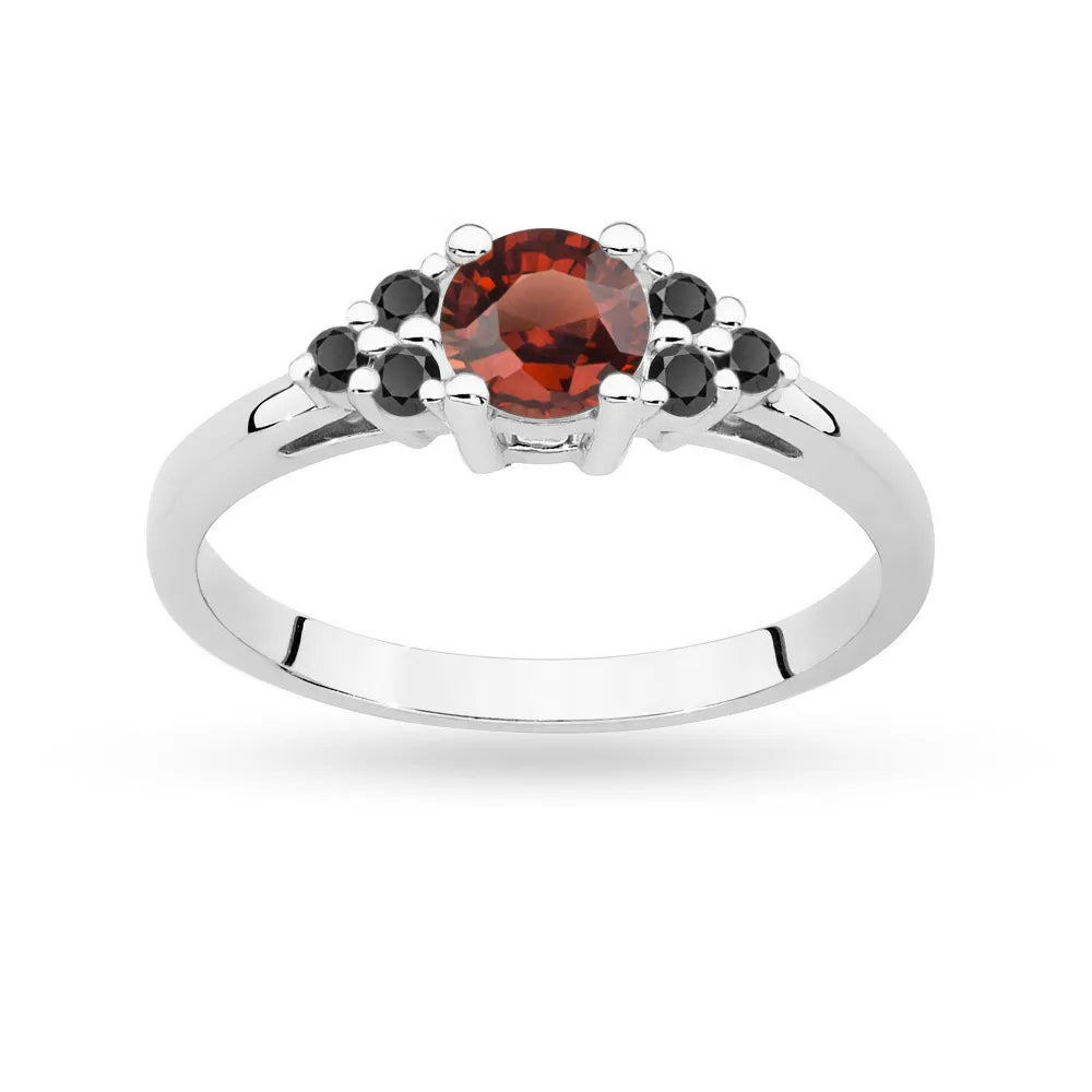White Gold 14k(585) ring with 0,60ct garnet with 6 black diamonds. Perfect for a gift.