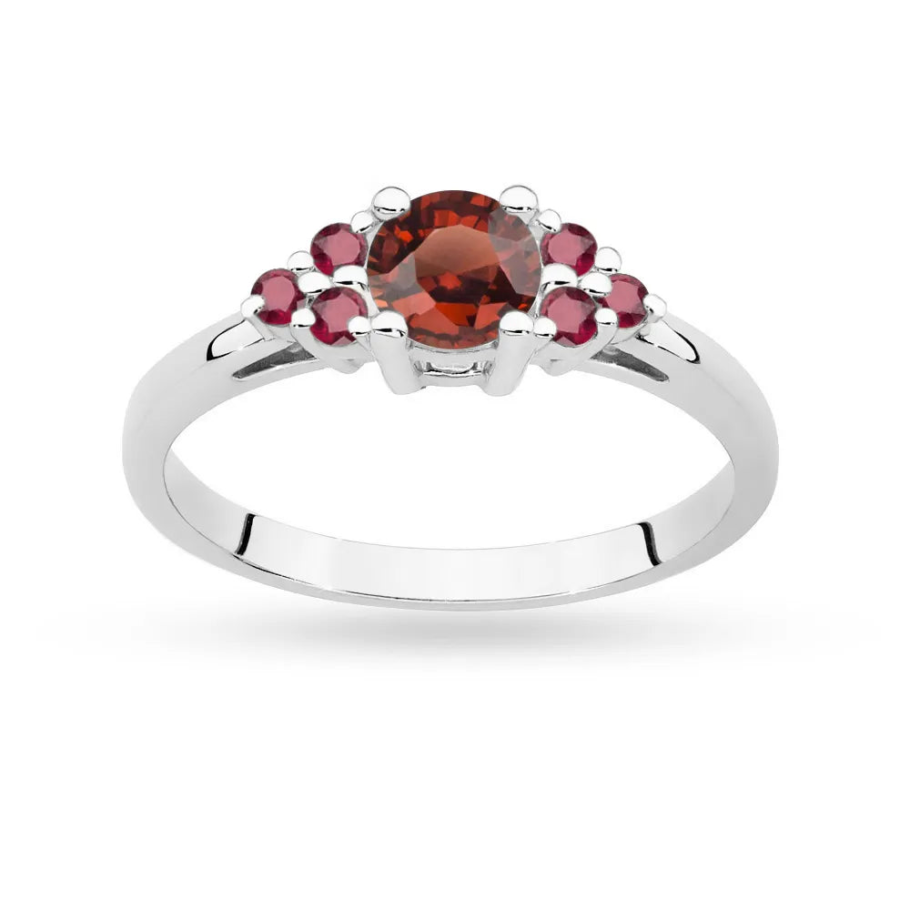 Ring aus 14-karätigem (585) Weißgold mit 0,60 ct Granat und 6 Rubinen. Perfekt als Geschenk.
