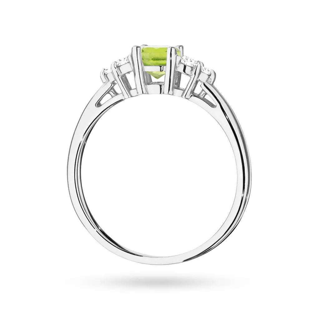 White Gold 14k(585) ring with 0,60ct olivine with 6 diamonds. Perfect for a gift.