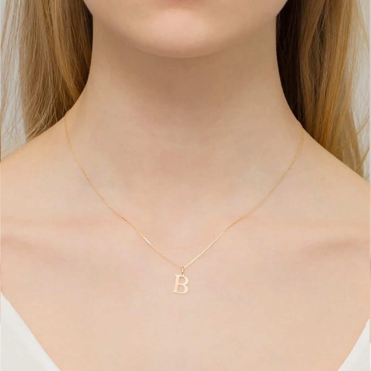 Collier en or rose 14 carats avec diamant de 0,005 ct. Cadeau excellent. L'authenticité du diamant est confirmée par un certificat.