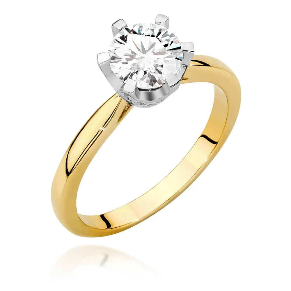 Prsten ze žlutého zlata 14k(585) s diamantem 1 ct a postranními diamanty 0,06 ct. Skvělý jako dárek.
