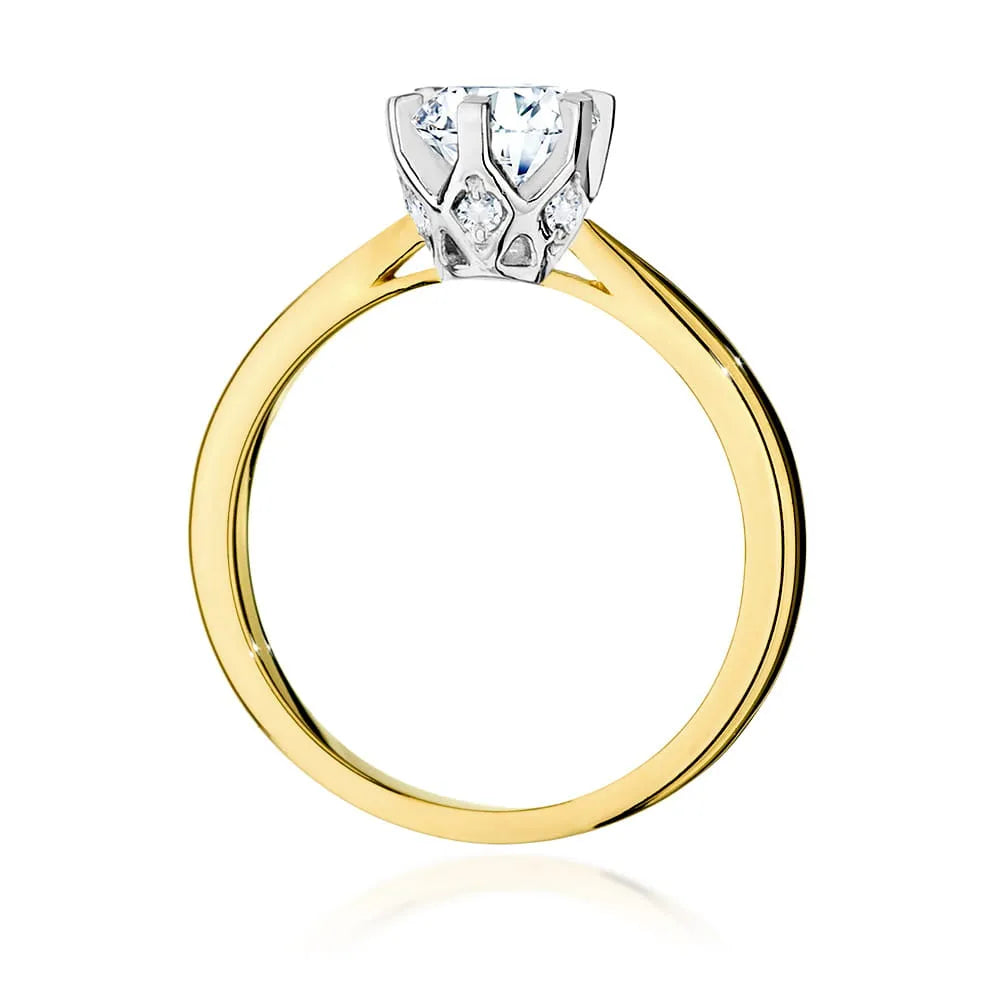 Prsten ze žlutého zlata 14k(585) s diamantem 1 ct a postranními diamanty 0,06 ct. Skvělý jako dárek.