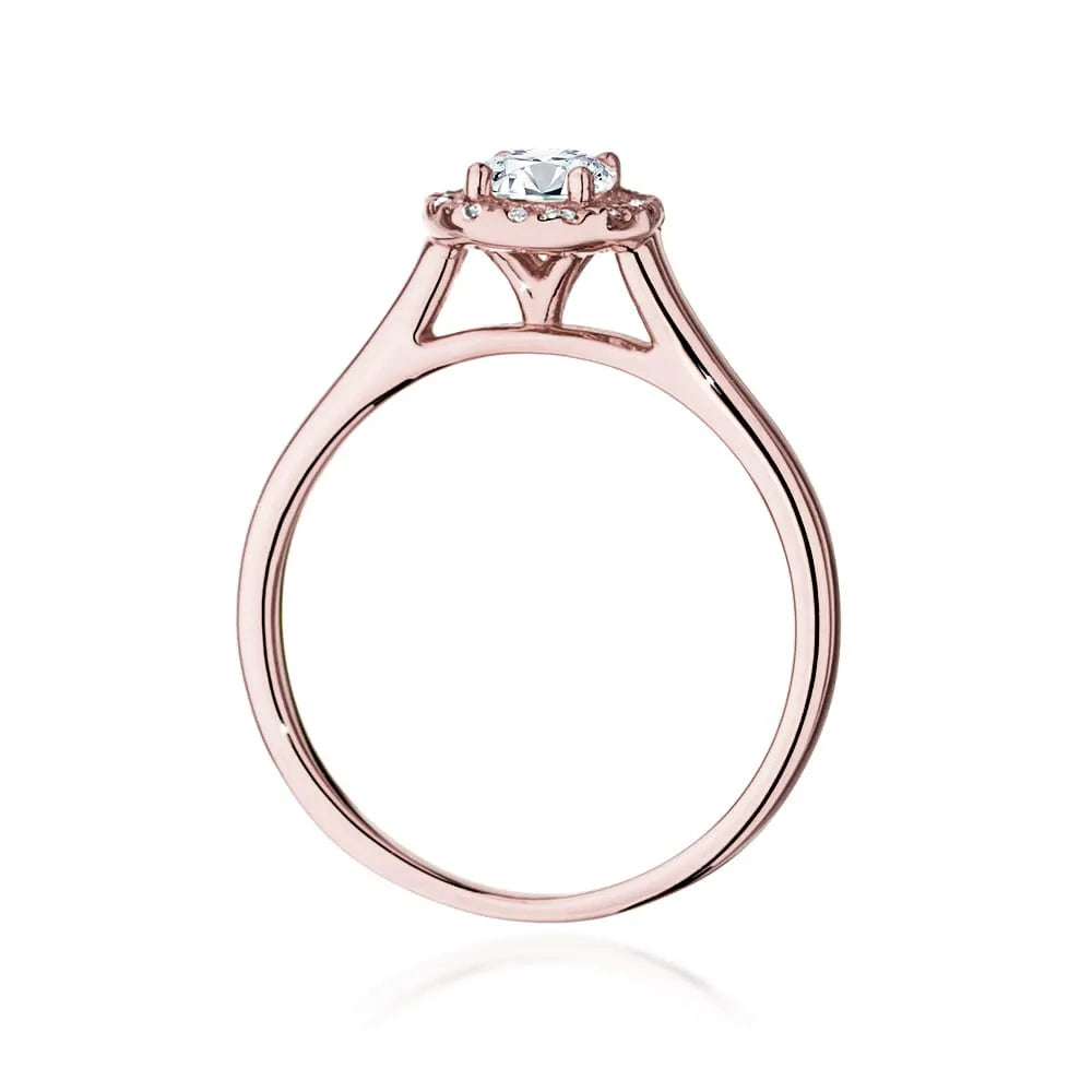 Rose Gold 14k(585) ring with 0,40ct diamond and side diamonds 0,12ct.  Perfect for a gift.