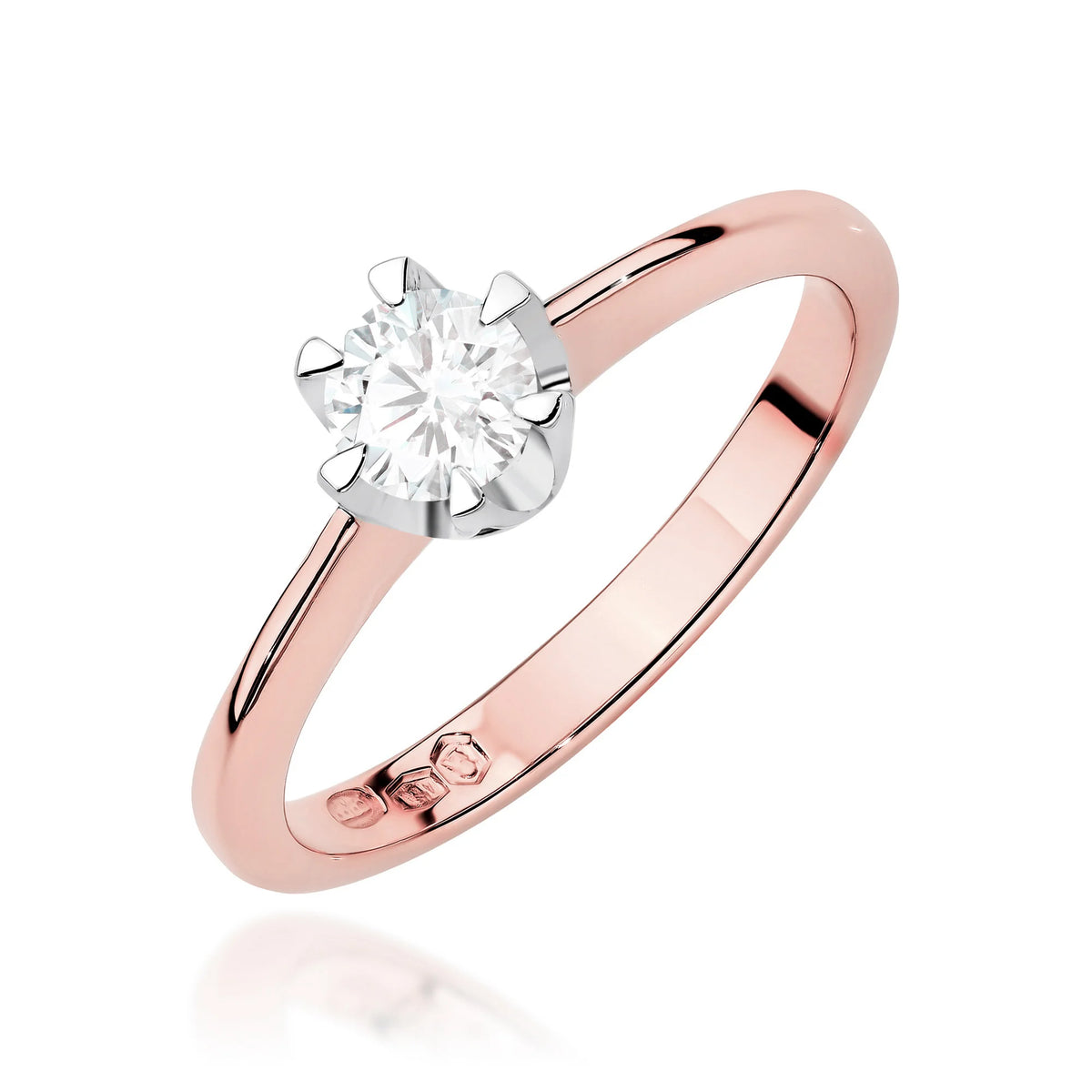 Rose Gold 14k(585) ring with 0,50ct diamond.  Is packaged in an elegant box, which is perfect for a gift.