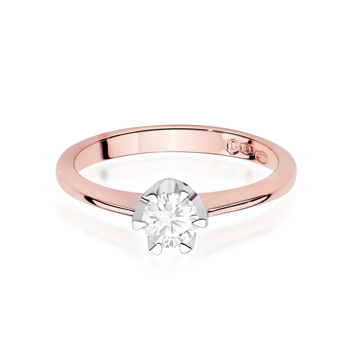 Rose Gold 14k(585) ring with 0,50ct diamond.  Is packaged in an elegant box, which is perfect for a gift.
