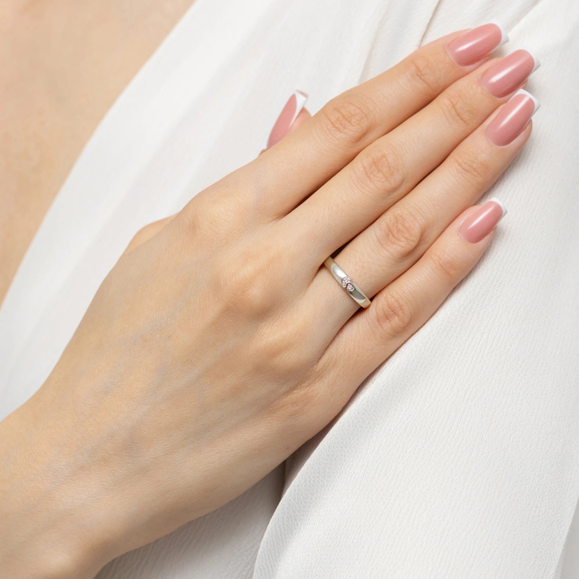 14k white gold ring with 2 pink zirconia hearts. Excelent gift. Perfect for everyday and special occasions.