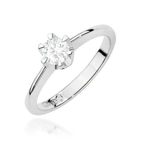 White Gold 14k(585) ring with 0,50ct diamond.  Is packaged in an elegant box, which is perfect for a gift.
