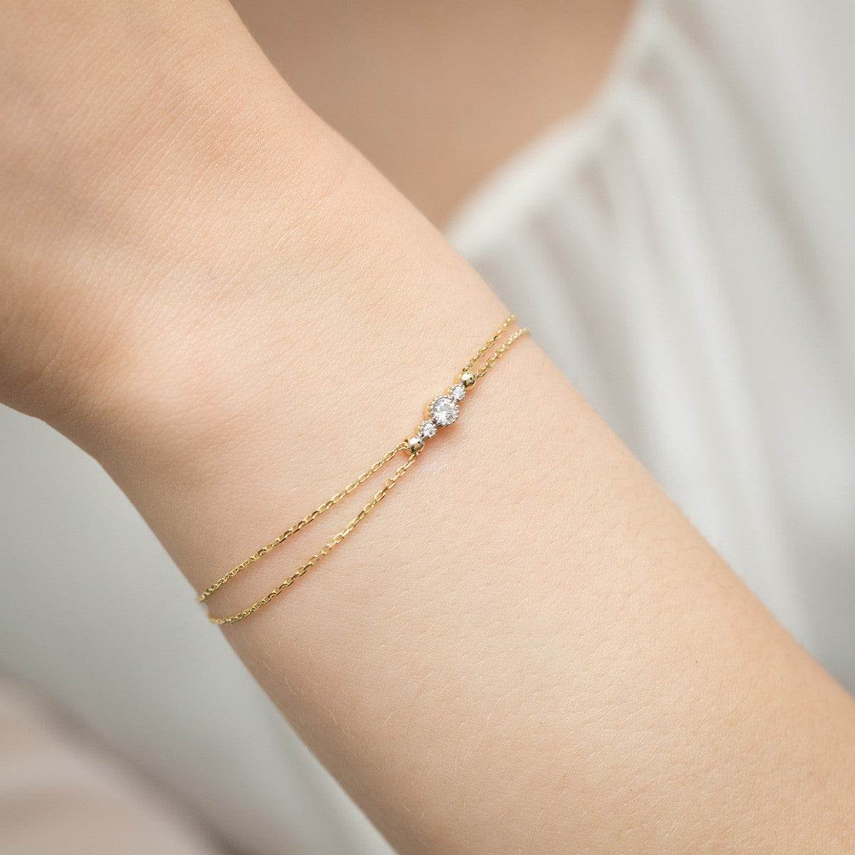 Náramek ze 14karátového zlata (585) | 0,15 ct tanzanit a 0,029 ct diamantů