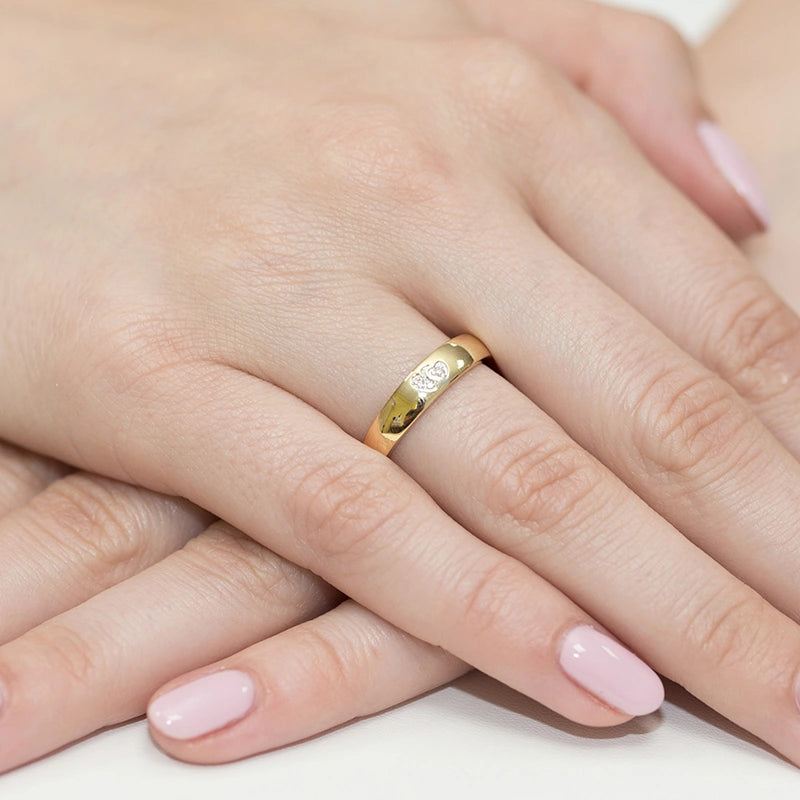 14k gold ring with 2 white zirconia hearts. Classic design with modern twist. Packed in black box, paper, and gift bag.