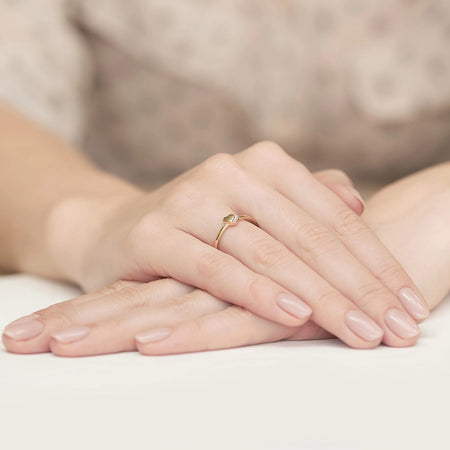 14k gold ring with 0.015ct diamonds. Packaged in an black box, paper and a gift bag.