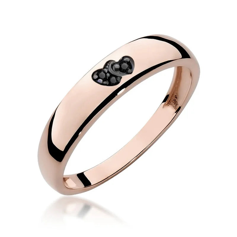 14k rose gold ring with 2 black zirconia hearts. Classic design with modern twist. Packed in black box, paper, and gift bag.