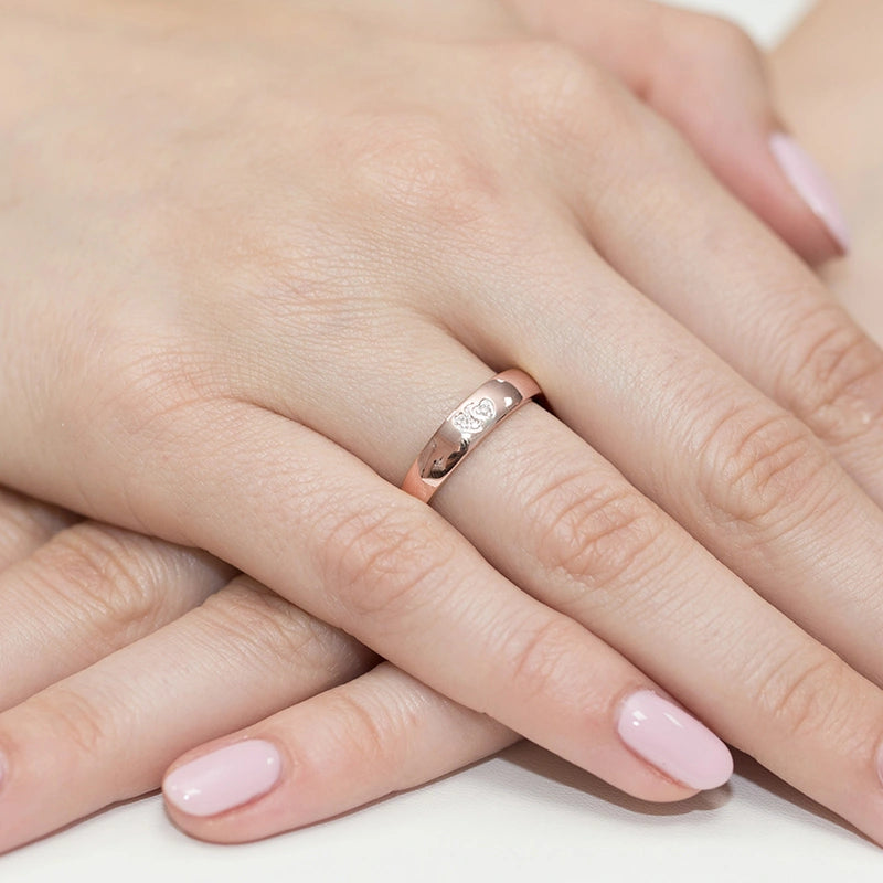 14k rose gold ring with 2 white zirconia hearts. Classic design with modern twist. Packed in black box, paper, and gift bag.
