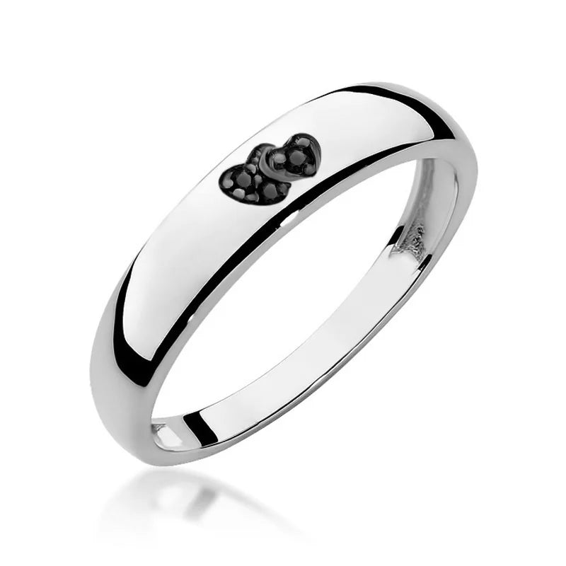 14k white gold ring with 2 black zirconia hearts. Classic design with modern twist. Packed in black box, paper, and gift bag.