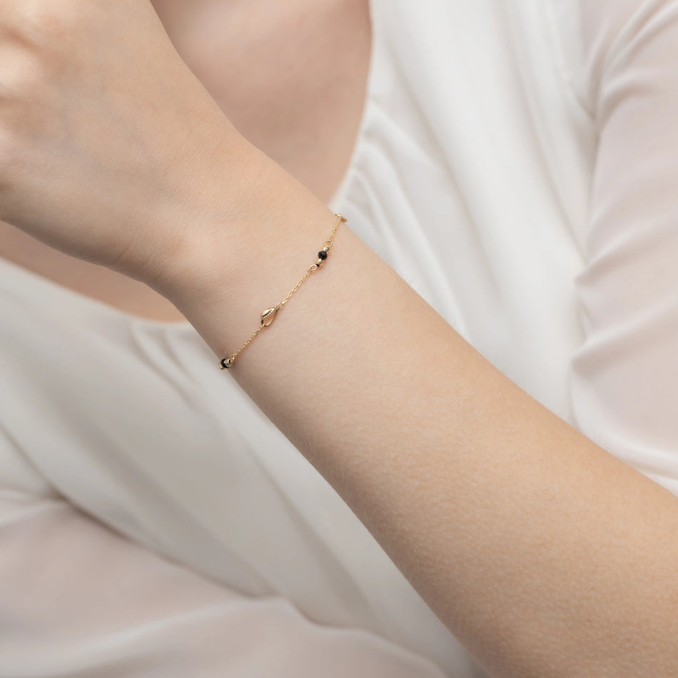 gold-bracelet-with-hearts-beads-and-black-stones-b-gw-381-585