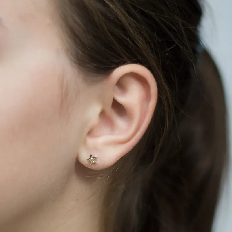 children-s-gold-stud-earrings-with-zirconia-star-k391-333