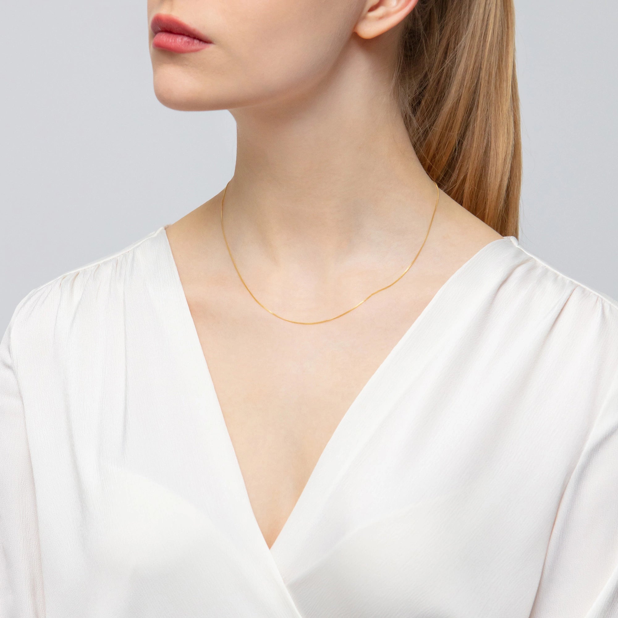 gold-curb-chain-0-7mm-l034-333