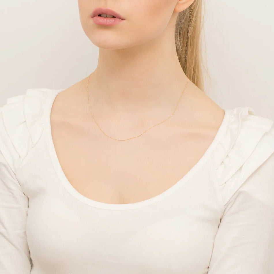 gold-curb-chain-0-7mm-l036-585