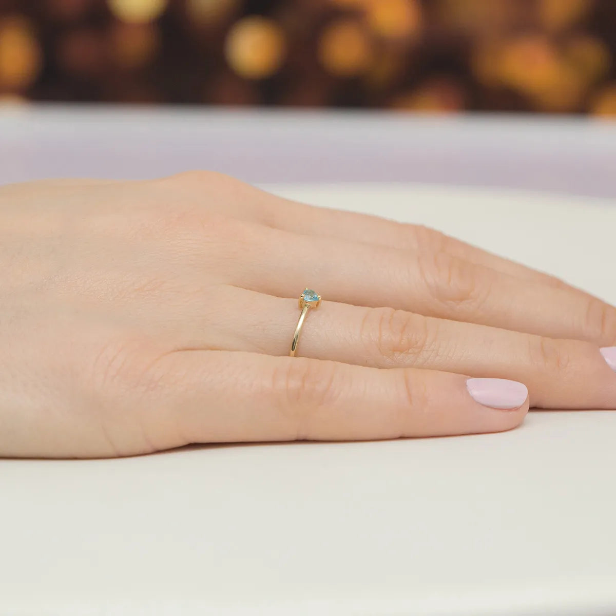 gold-ring-with-0-12ct-topaz-p129-585-t0-12