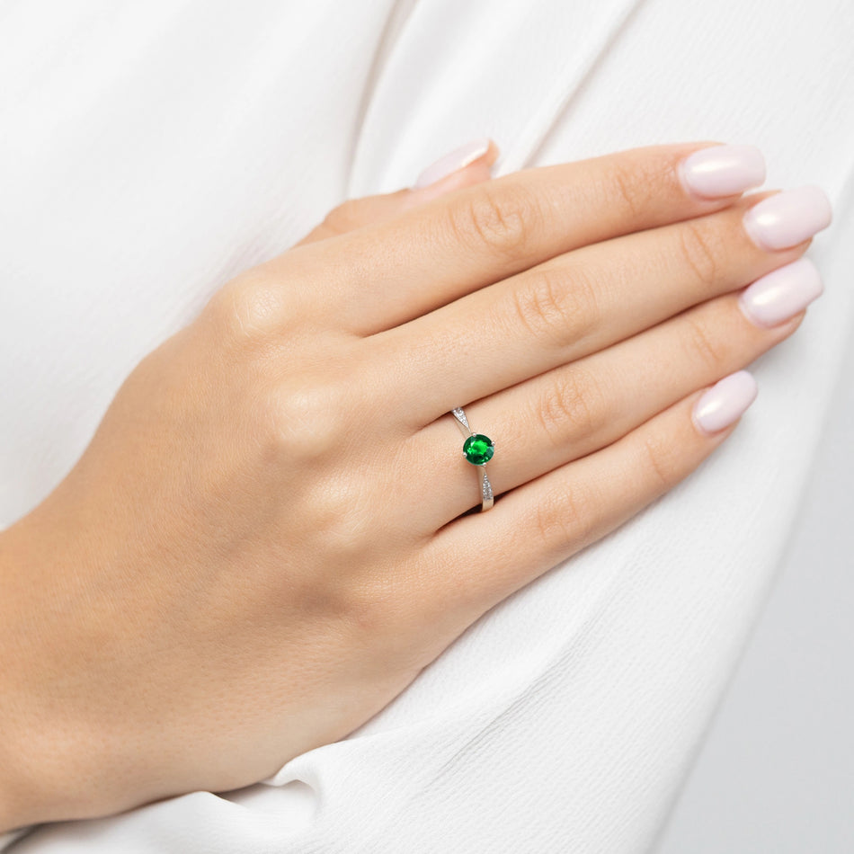 zlatý prsteň s 0,50 ct smaragdom a 0,068 ct diamantmi p167 585 veľkosť 0,50