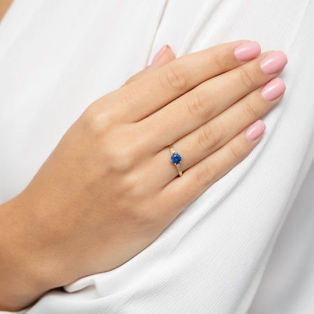 8k-gold-ring-with-dark-blue-zirconia-p177-333-g