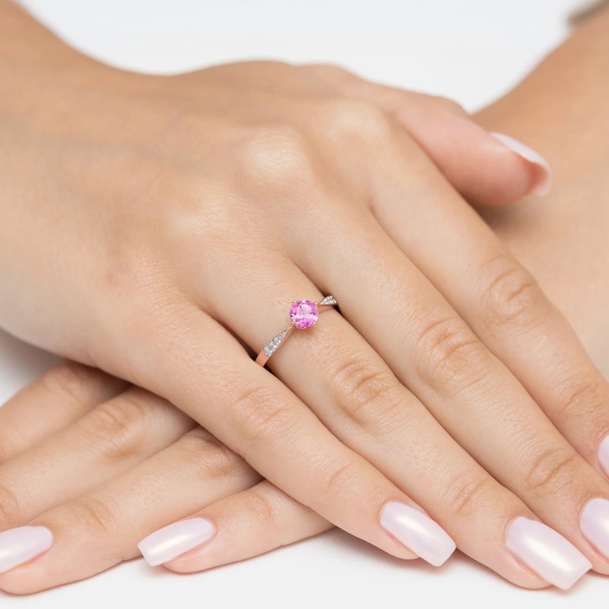 gold-ring-with-0-60ct-pink-topaz-and-0-068ct-diamonds-p167-585-rt0-60