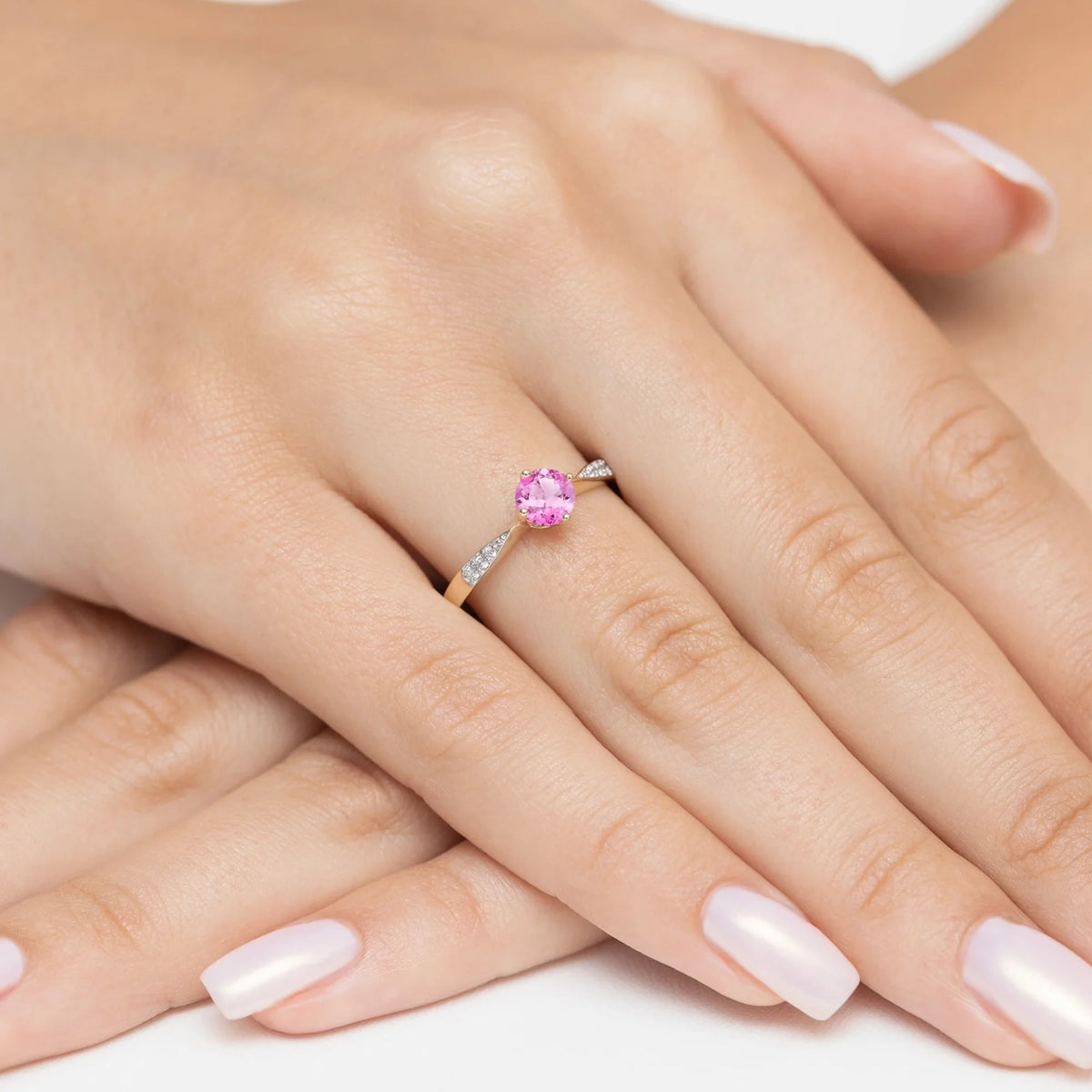 zlatý prsteň so 0,60 ct ružovým topásom a 0,068 ct diamantmi p167-585-rt0-60