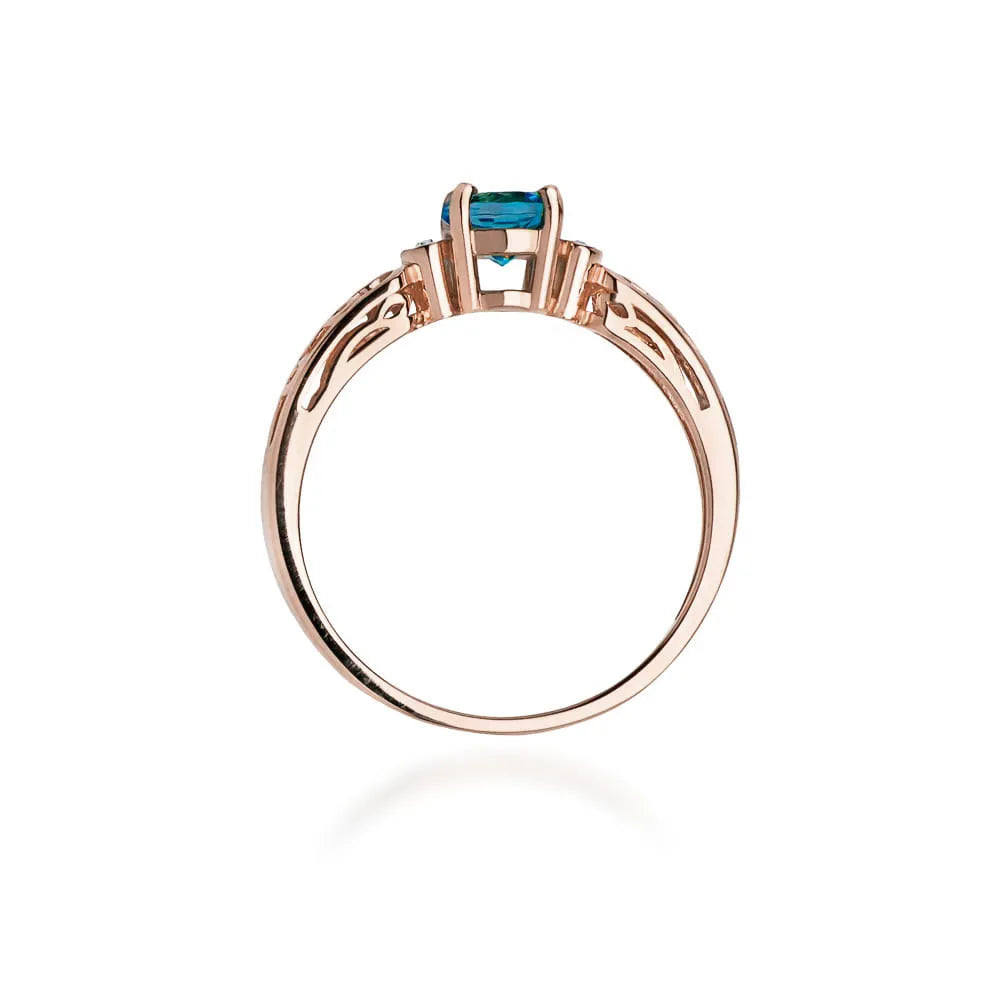gold-ring-with-0-50ct-topaz-london-blue-and-0-02ct-diamonds-w0014-tol-01