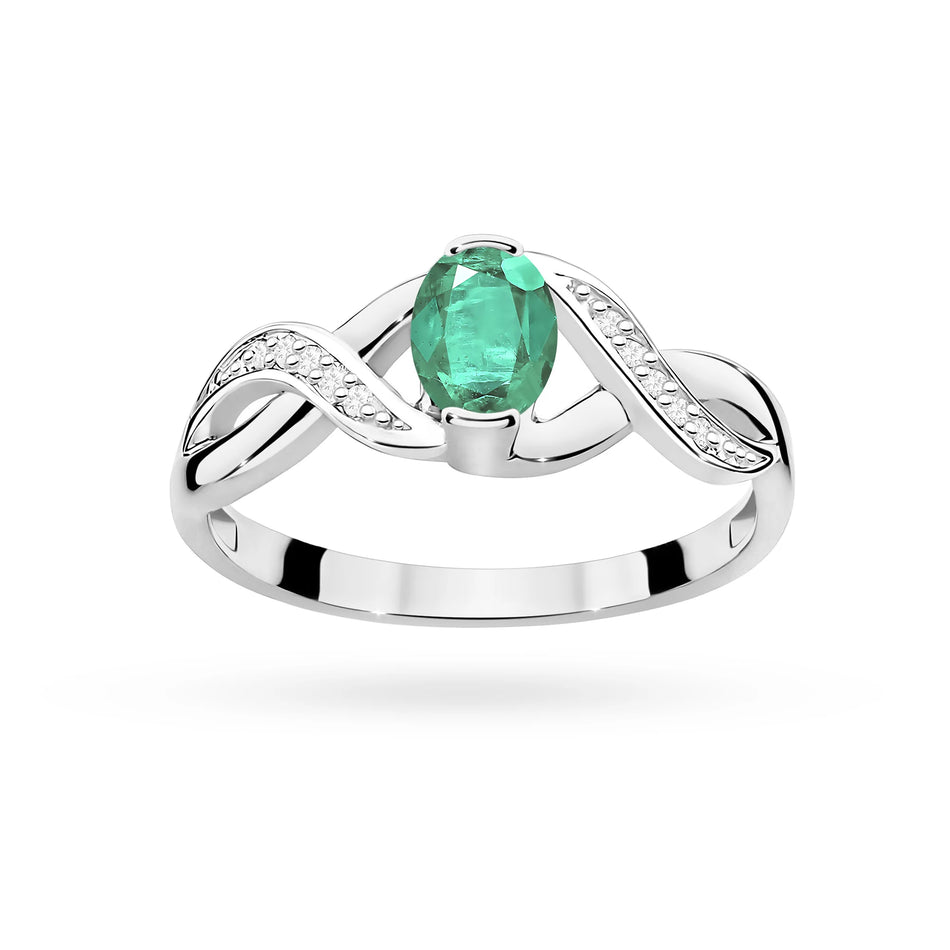 Prsten z bílého zlata se smaragdem 0,40 ct a diamanty 0,05 ct
