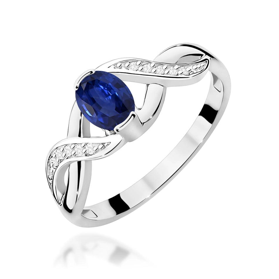 Prsten z bílého zlata s 0,70ct safírem a 0,05ct diamanty