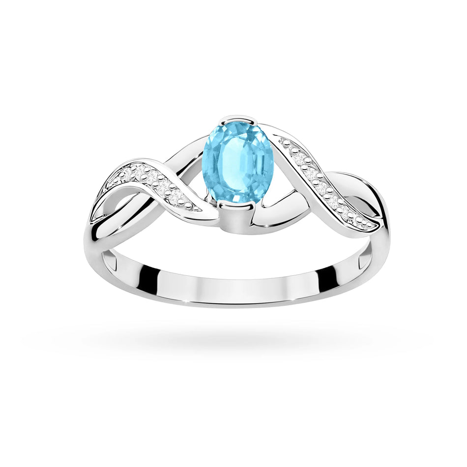 Prsten z bílého zlata s topazem 0,50 ct a diamanty 0,05 ct