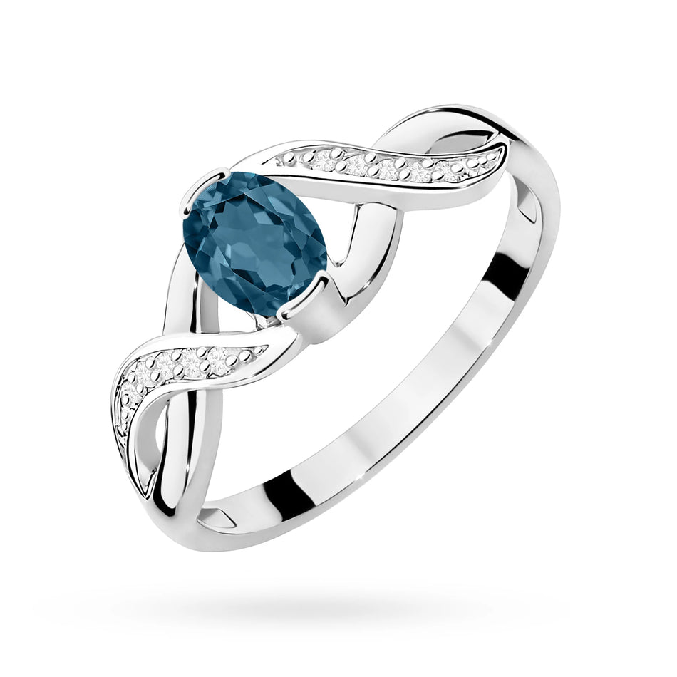 Bague en or blanc avec topaze London Blue 0,50 ct et diamants 0,05 ct