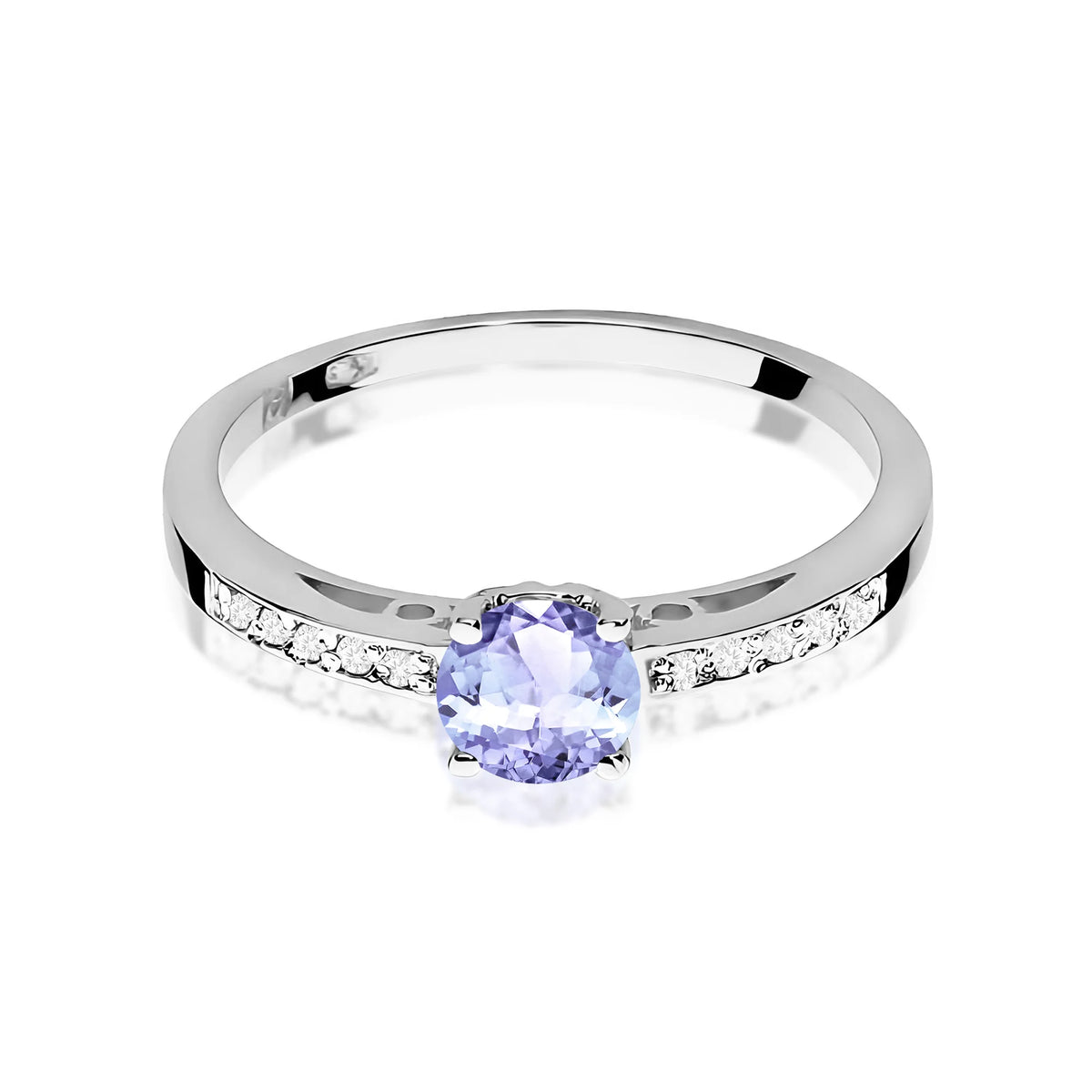 Prsten z bílého 14k zlata s diamanty na ramenou prstenu s tanzanitem 0,50 ct a diamanty 0,05 ct