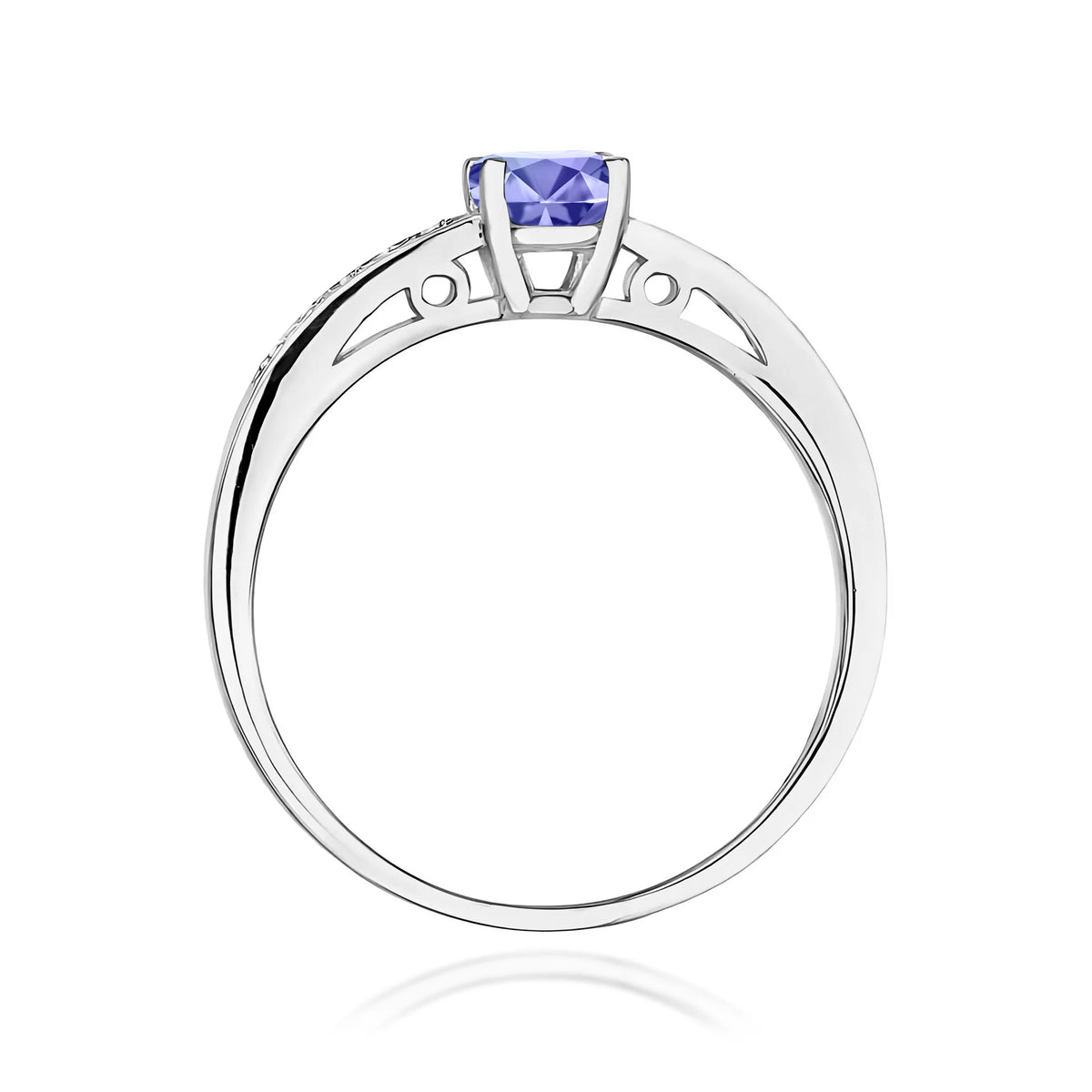 Prsten z bílého 14k zlata s diamanty na ramenou prstenu s tanzanitem 0,50 ct a diamanty 0,05 ct