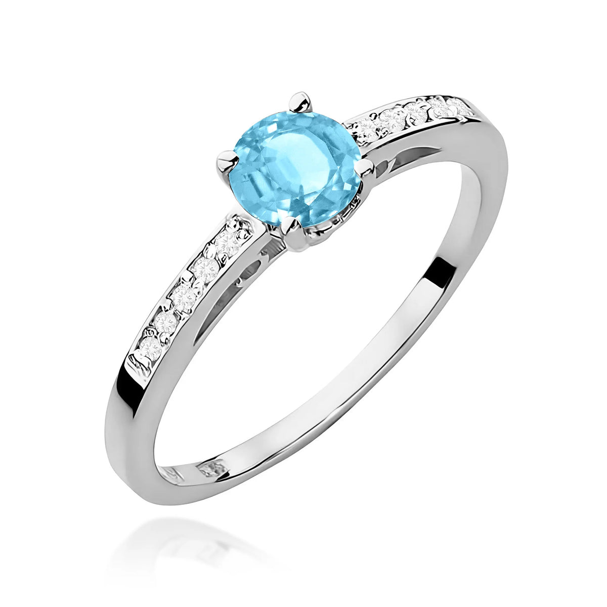 Prsten z bílého 14k zlata s diamanty na ramenou prstenu s topazem Swiss Blue 0,50 ct a diamanty 0,05 ct