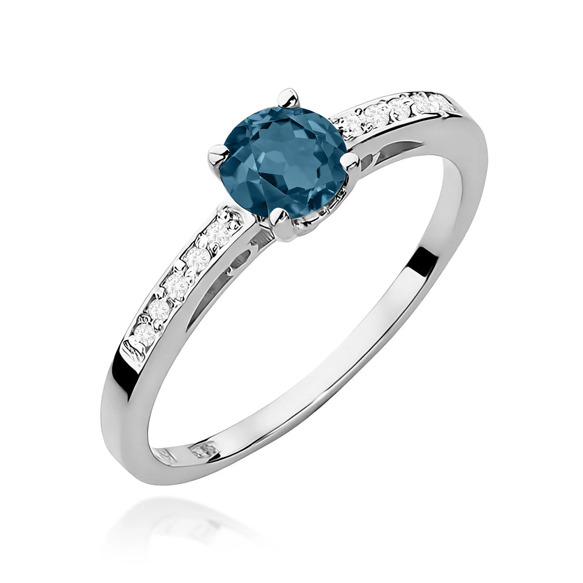 Prsten z bílého 14k zlata s diamanty na ramenou prstenu s topazem London Blue 0,50 ct a diamanty 0,05 ct