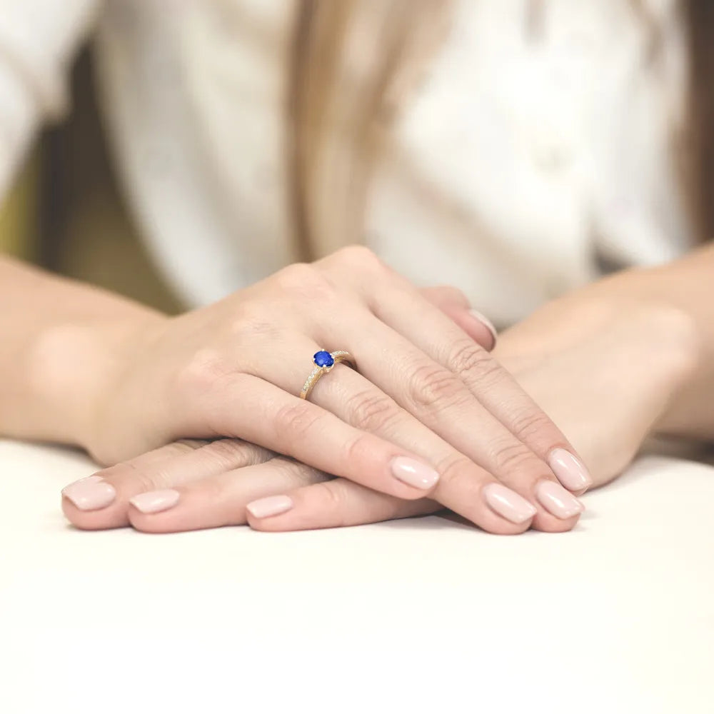 gold-ring-with-0-70ct-sapphire-and-0-05ct-diamonds-w0067-sab-01
