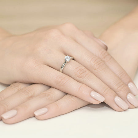 gold-ring-with-0-60ct-white-sapphire-and-0-01ct-diamonds-w0074-saw-01