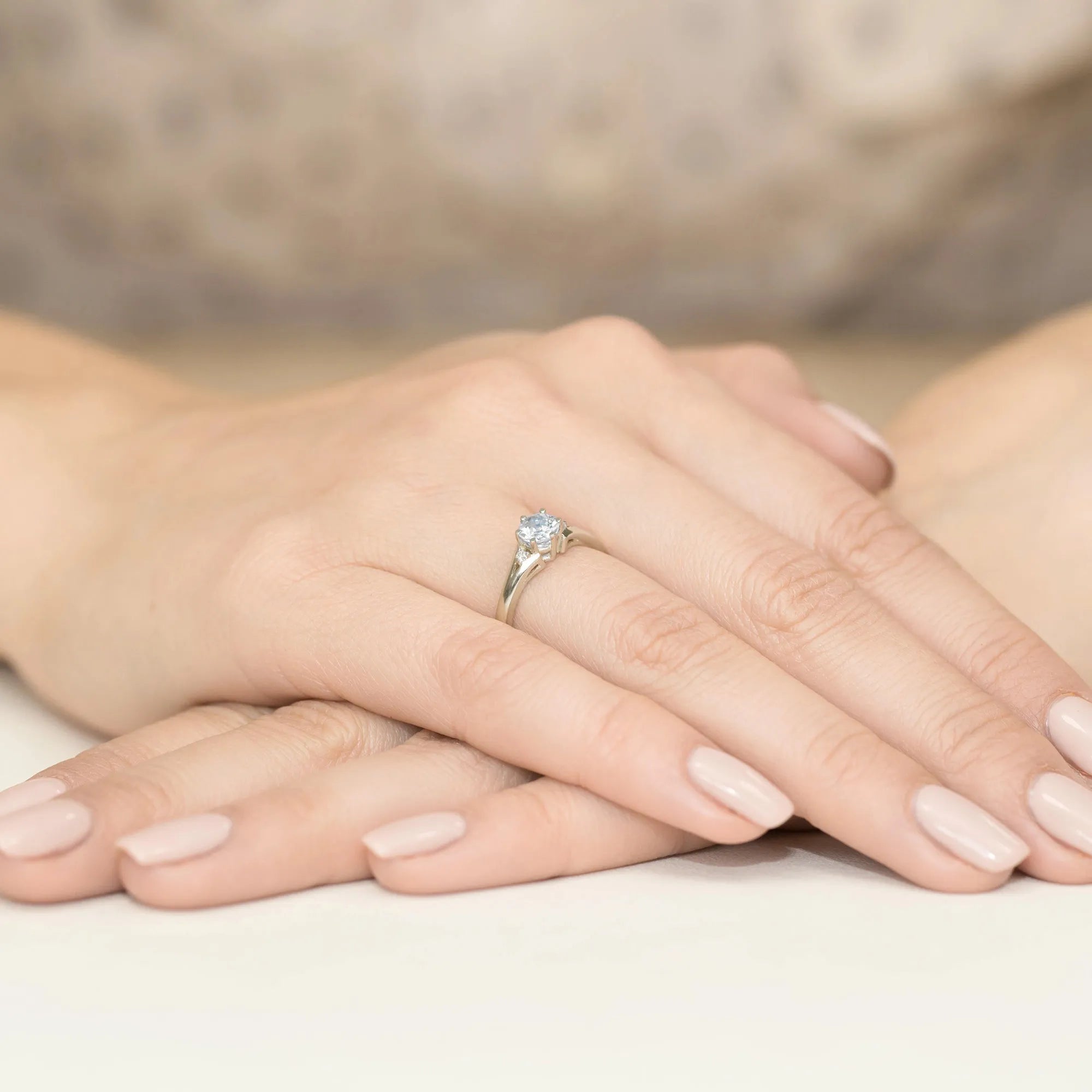 gold-ring-with-0-60ct-white-sapphire-and-diamonds-w0076-saw-01