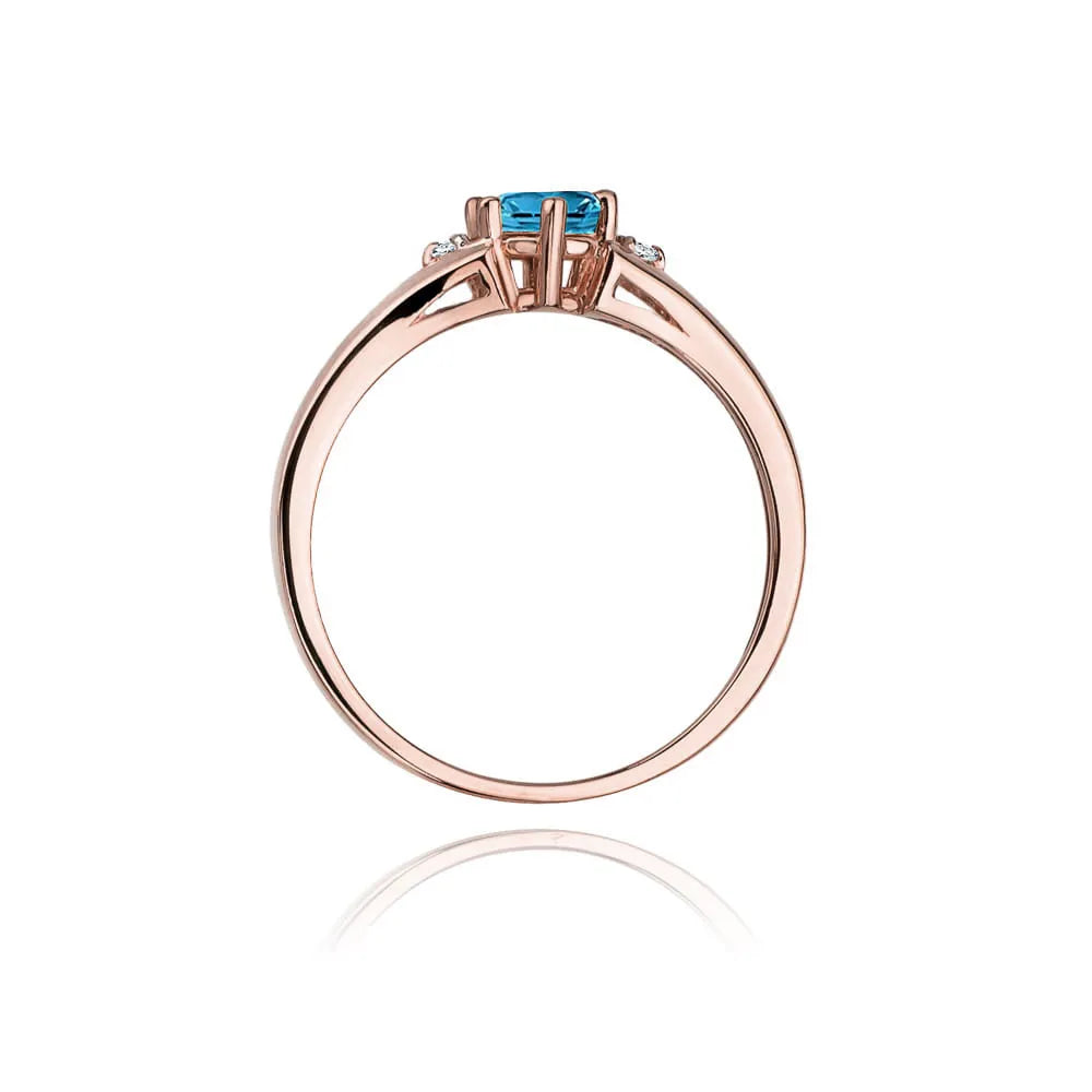 gold-ring-with-0-50ct-topaz-london-blue-and-diamonds-w0076-tol-01